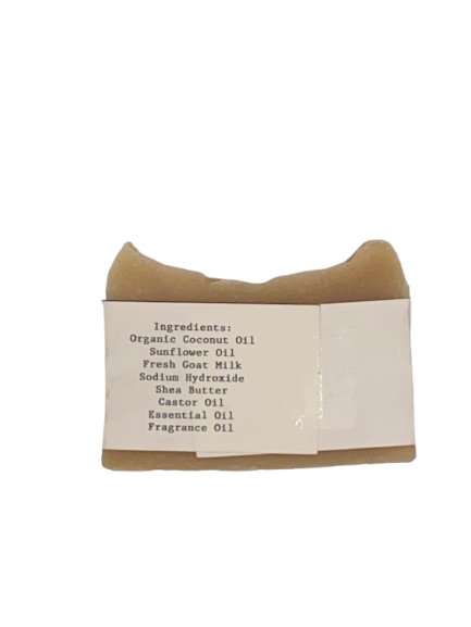Goat milk soap bar wrapped in white belly band labeled Hale’s Peachy Clean