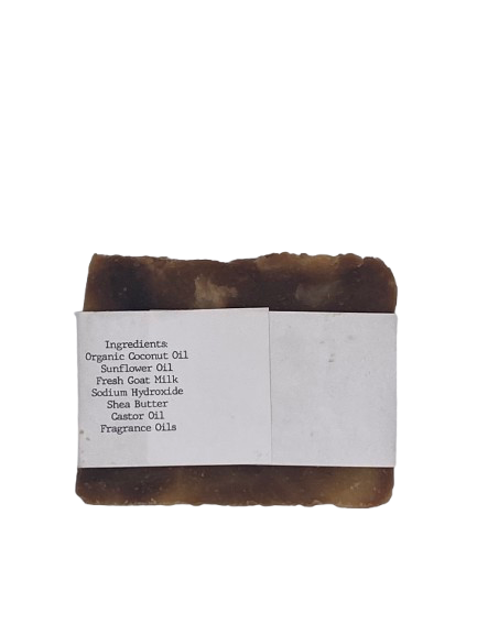 Goat milk soap bar wrapped in white belly band labeled ‘Bandwagon’ with pumpkin spice fragrance/ingredients list