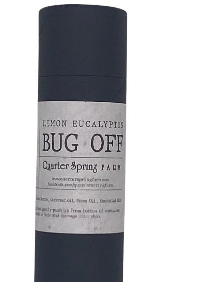 Bug repellent lotion in push-up tube labeled ‘Bug Off’ with neem, lemon, and eucalyptus oils