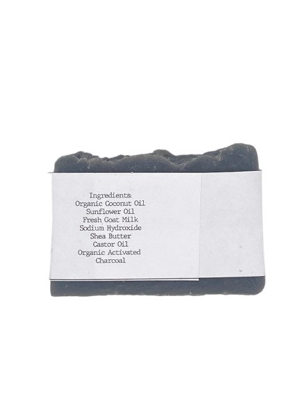 Bar of soap with a label detailing ingredients on a white background
