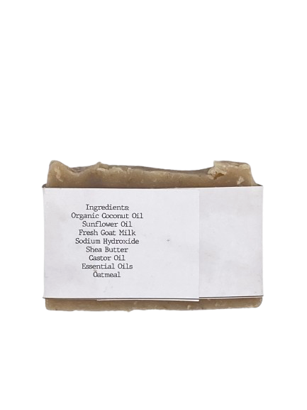 Bar of soap with a label showing ingredients on a white background