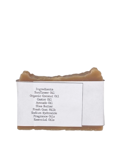 Solid shampoo bar wrapped in white belly band labeled ‘Kentucky Gentleman’ with bourbon and cedarwood essential oils